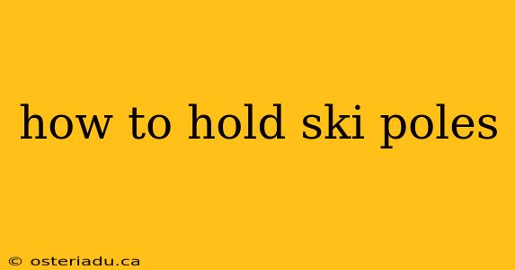 how to hold ski poles