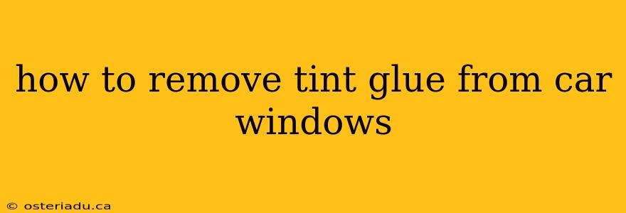 how to remove tint glue from car windows